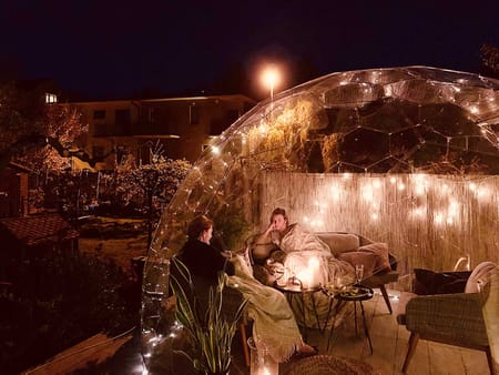 Illuminated garden igloo by night