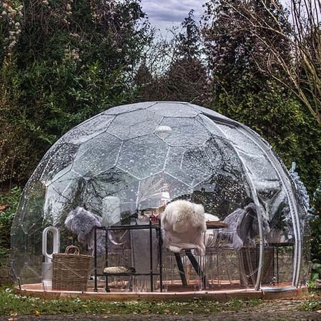 Garden dining space inside a dome