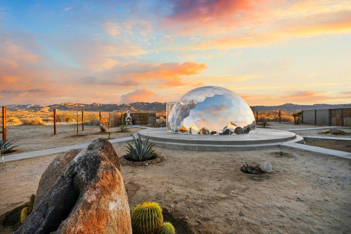 Mirror Hypedome glamping dome in the desert at sunset
