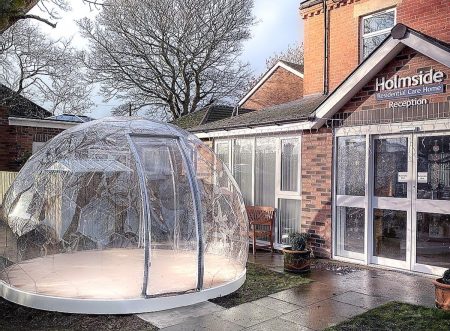 Hypedome outdoor pod in a Home Care's garden