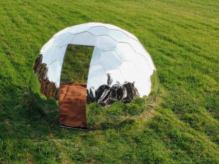 Hypedome Mirror Dome - a mirrored garden dome on the grass