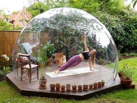 Practicing yoga in a garden pod