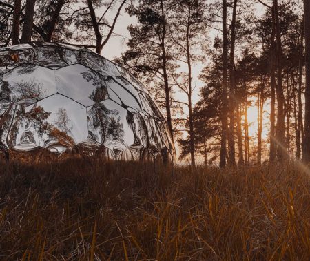 Glamping pod in the woods blurred with outdoors