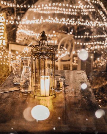 Illuminated and decorated table inside a dome