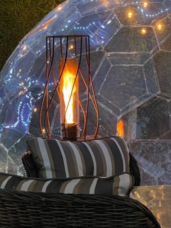Outdoor fireplace and dining pods