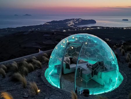 Illuminated dome in a coastal area