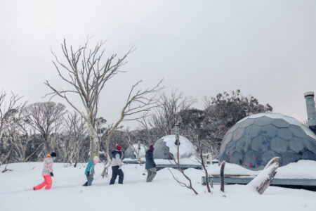 A snowshoe walk to the glamping pods