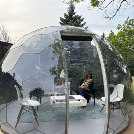 Garden retreat in a backyard pod with minimalist furnishings