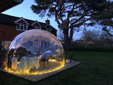 Cosy winter patio idea with a geodesic garden dome