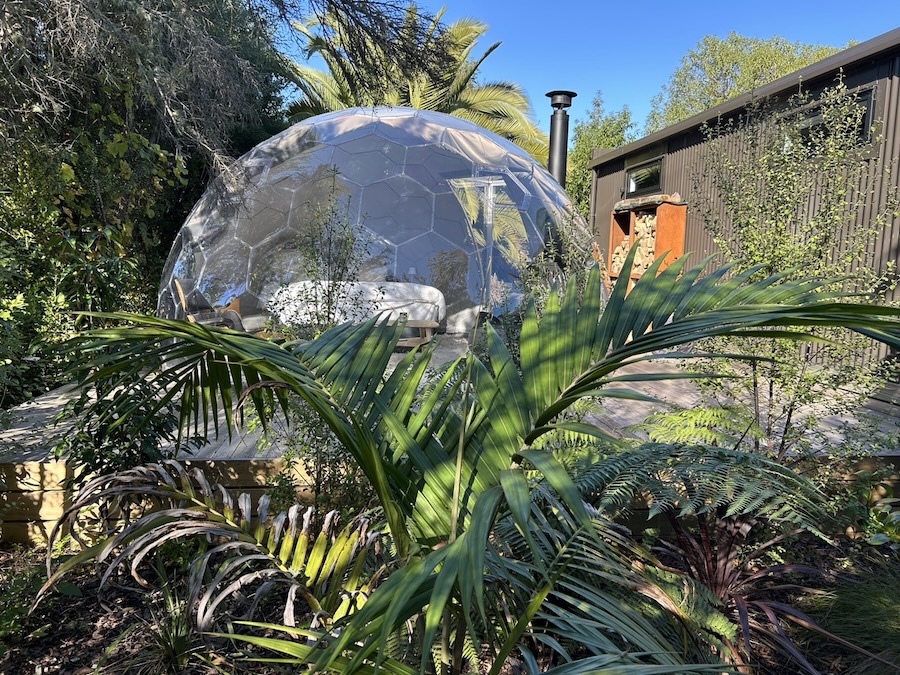 A garden dome in the backyard of the modular house
