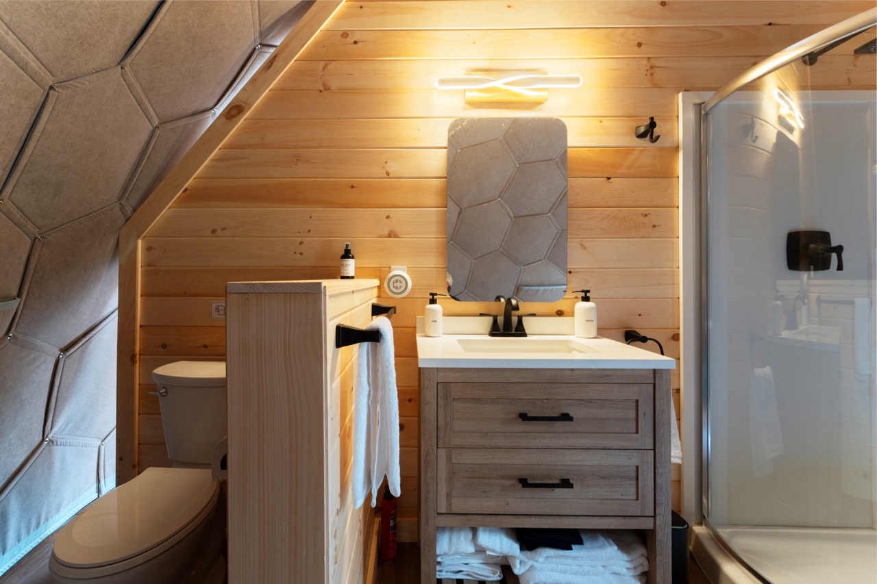 A bathroom section in a Nova Nook glamping dome