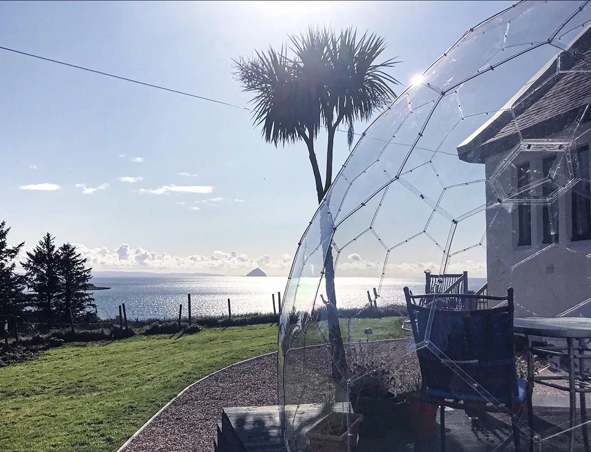 Clear garden bubble pod by the sea