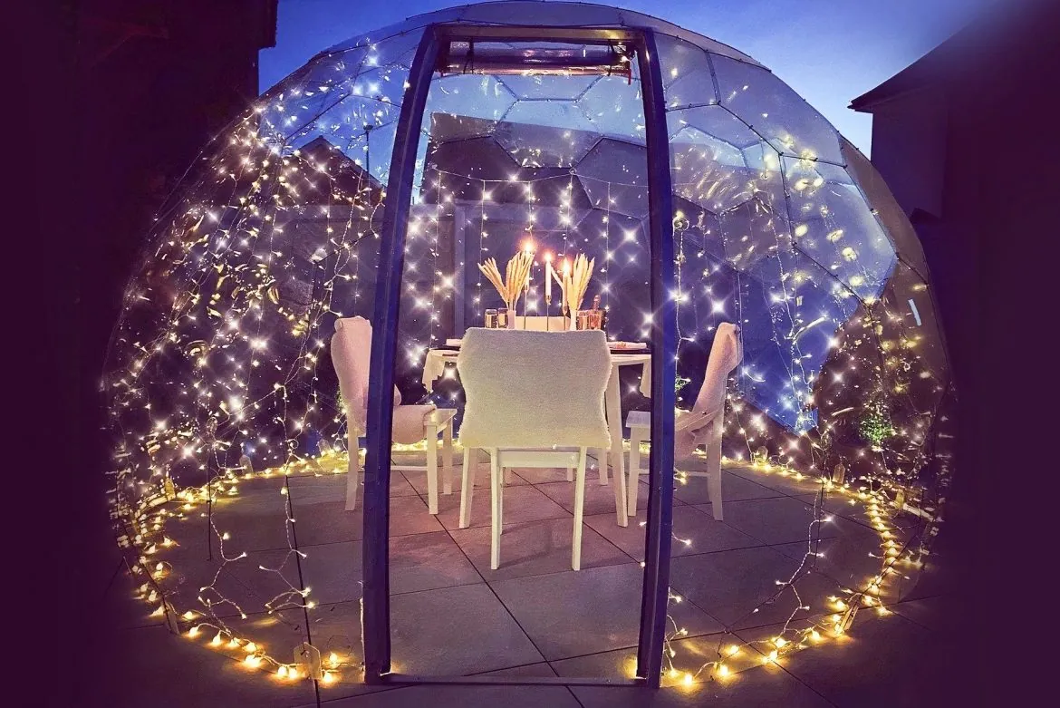 Dining pod decorated with lights