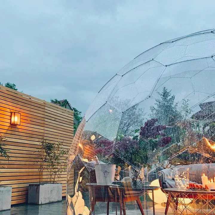 See-through garden dome at dusk