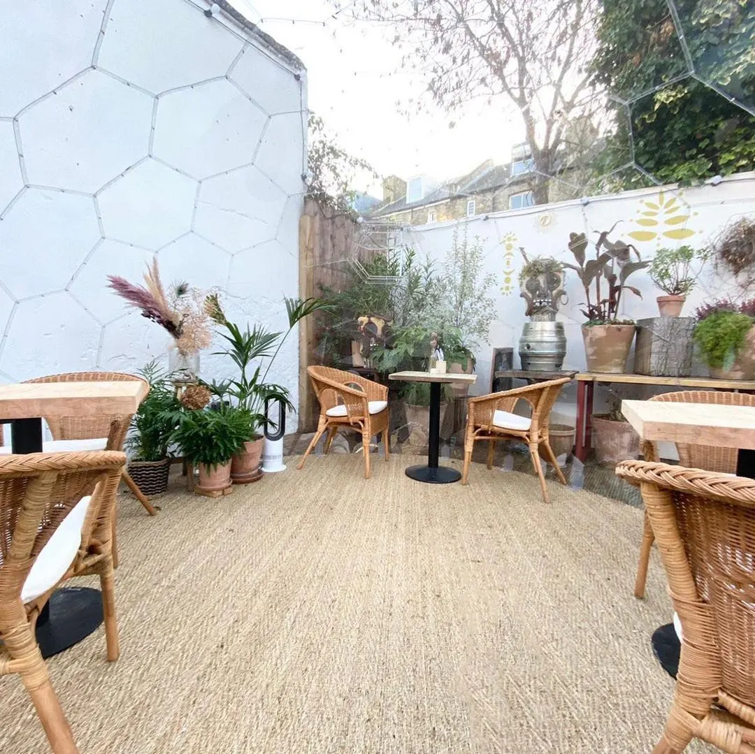 Dining tables inside a Hypedome garden pod