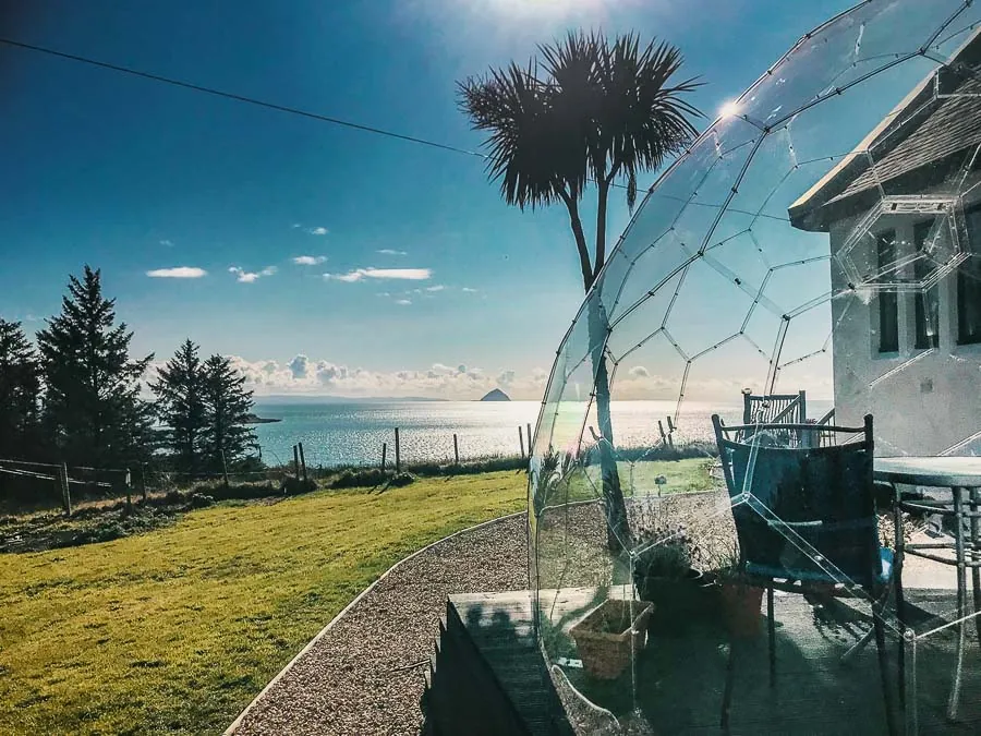 Clear garden igloo dome by the sea