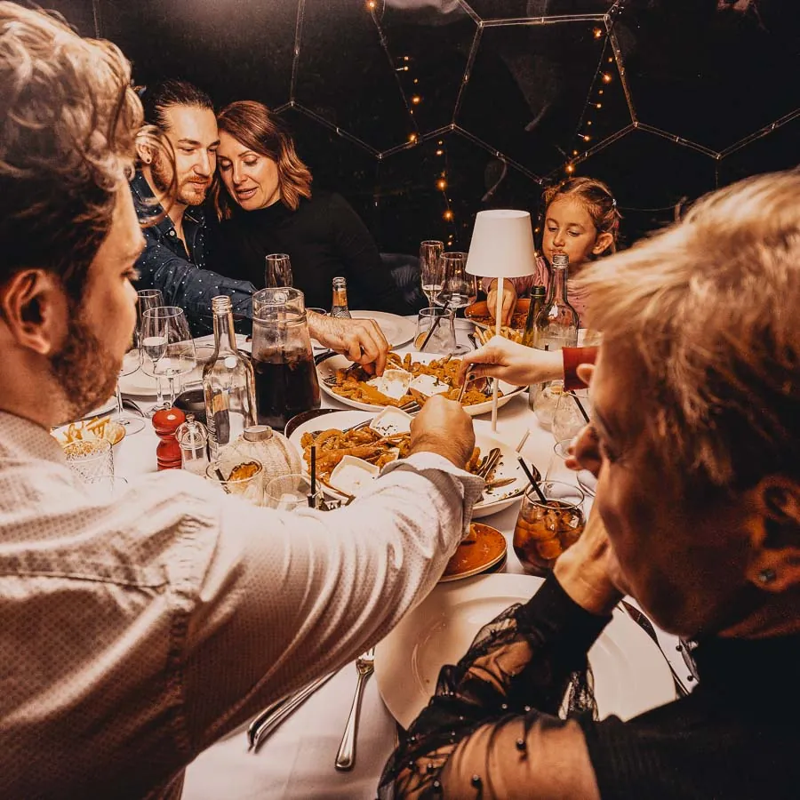 Family celebrating with dome dining