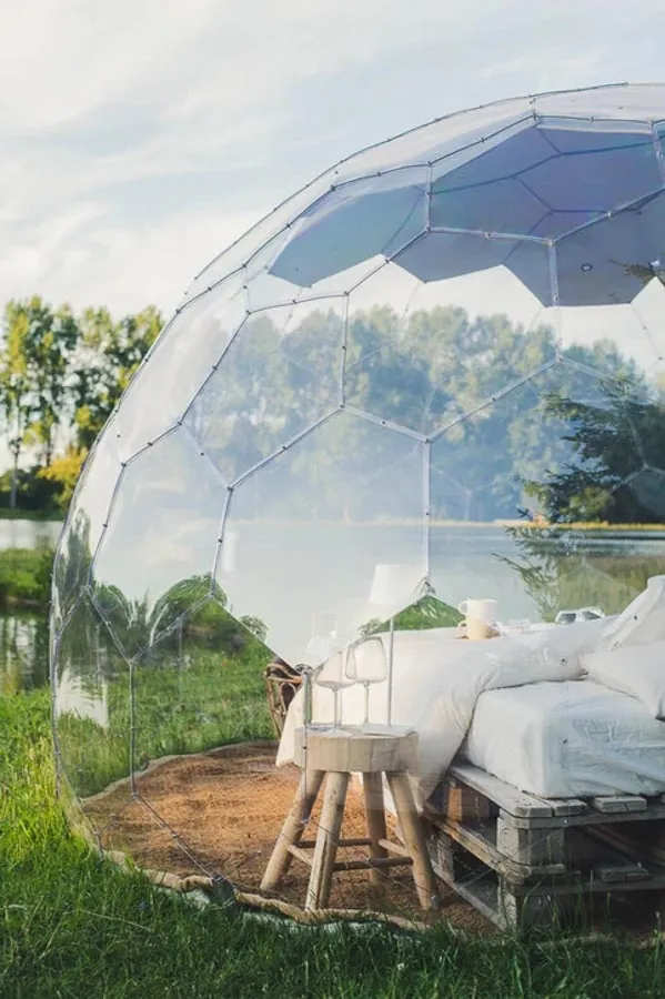 Bedroom in a glamping dome by the lake