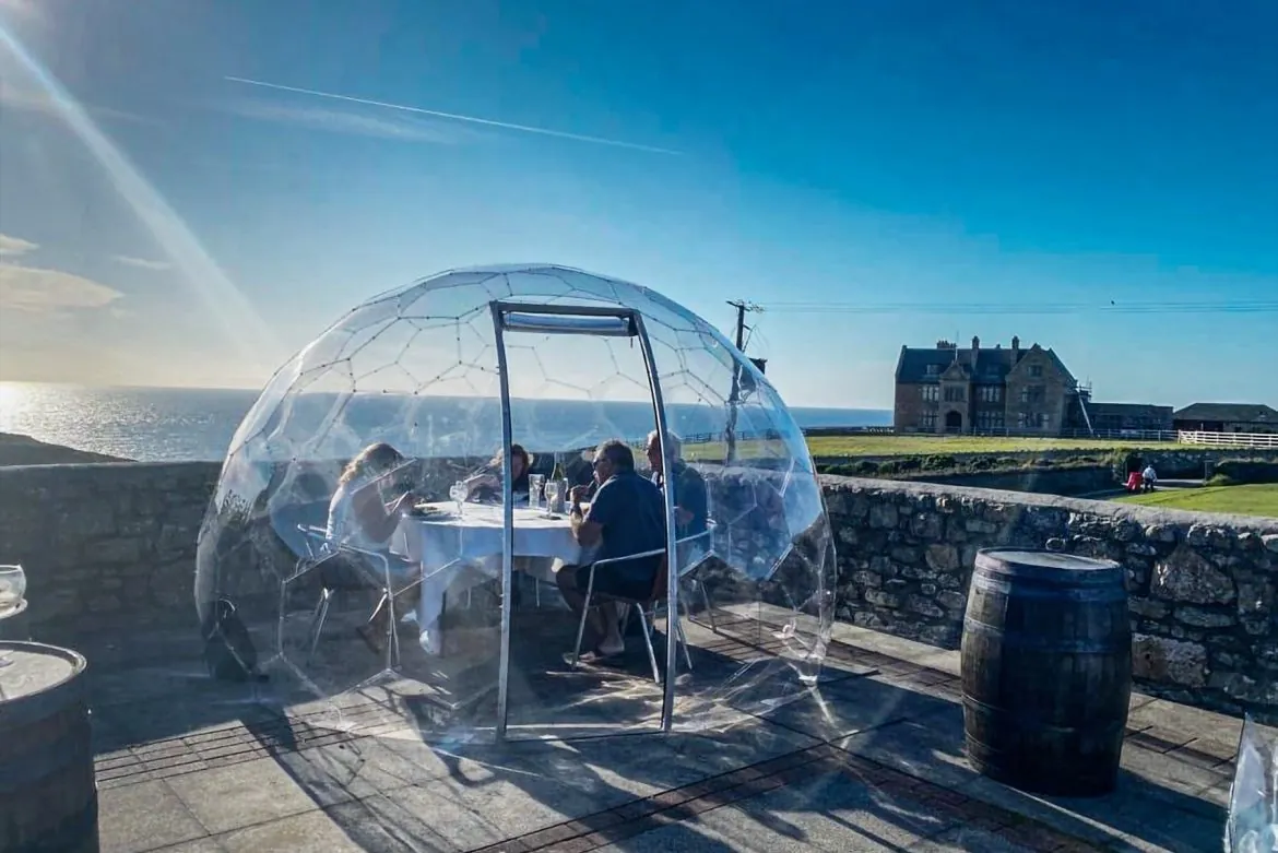 Family reunion in an outdoor dome for dining