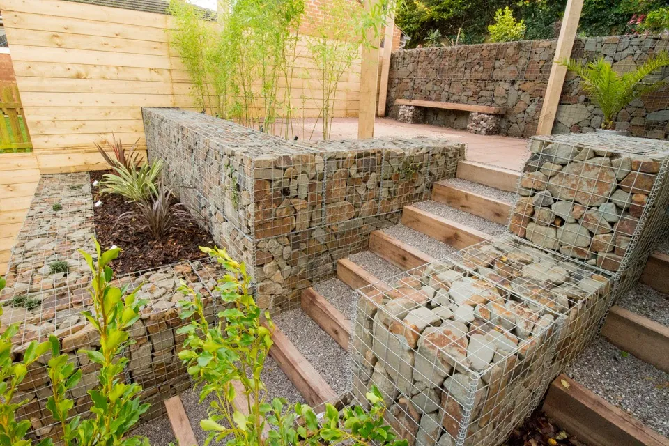 Industrial gabions in a small garden