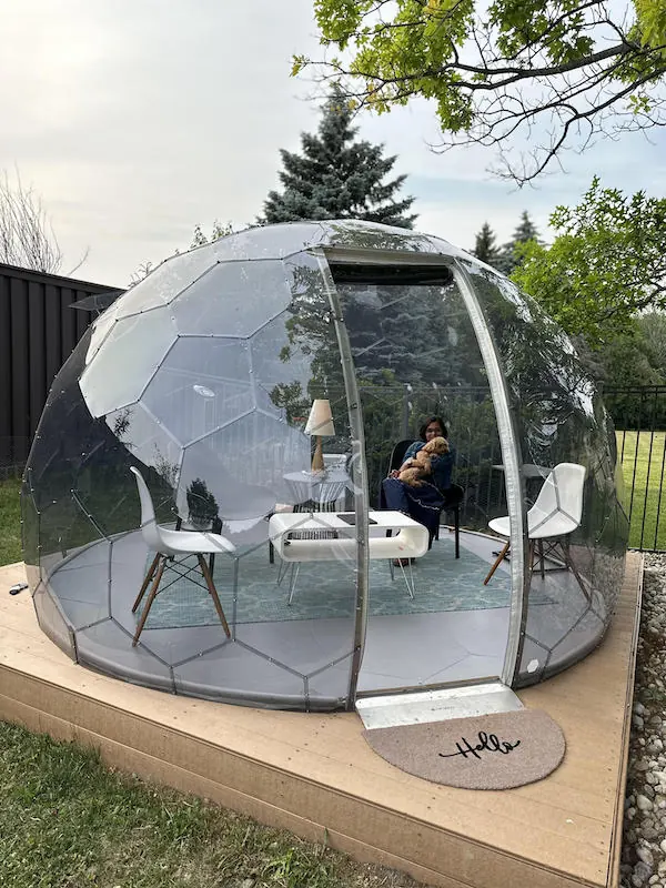 Renu relaxing in her garden pod