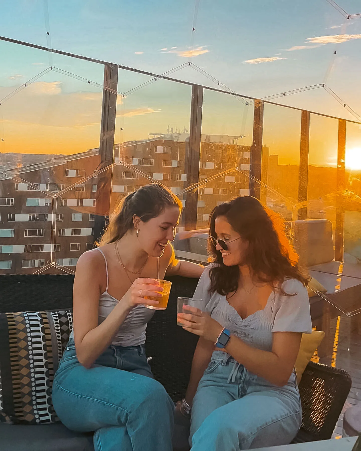 Two friends having a drink in the she shed kit