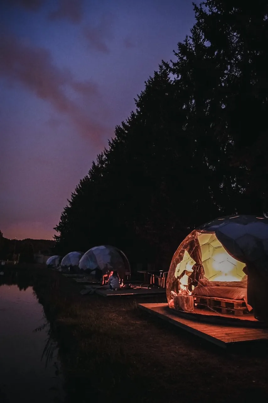 Illuminated glamping retreat by night