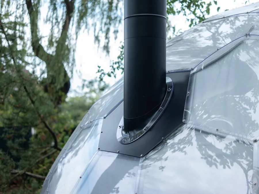 Glamping dome with a chimney