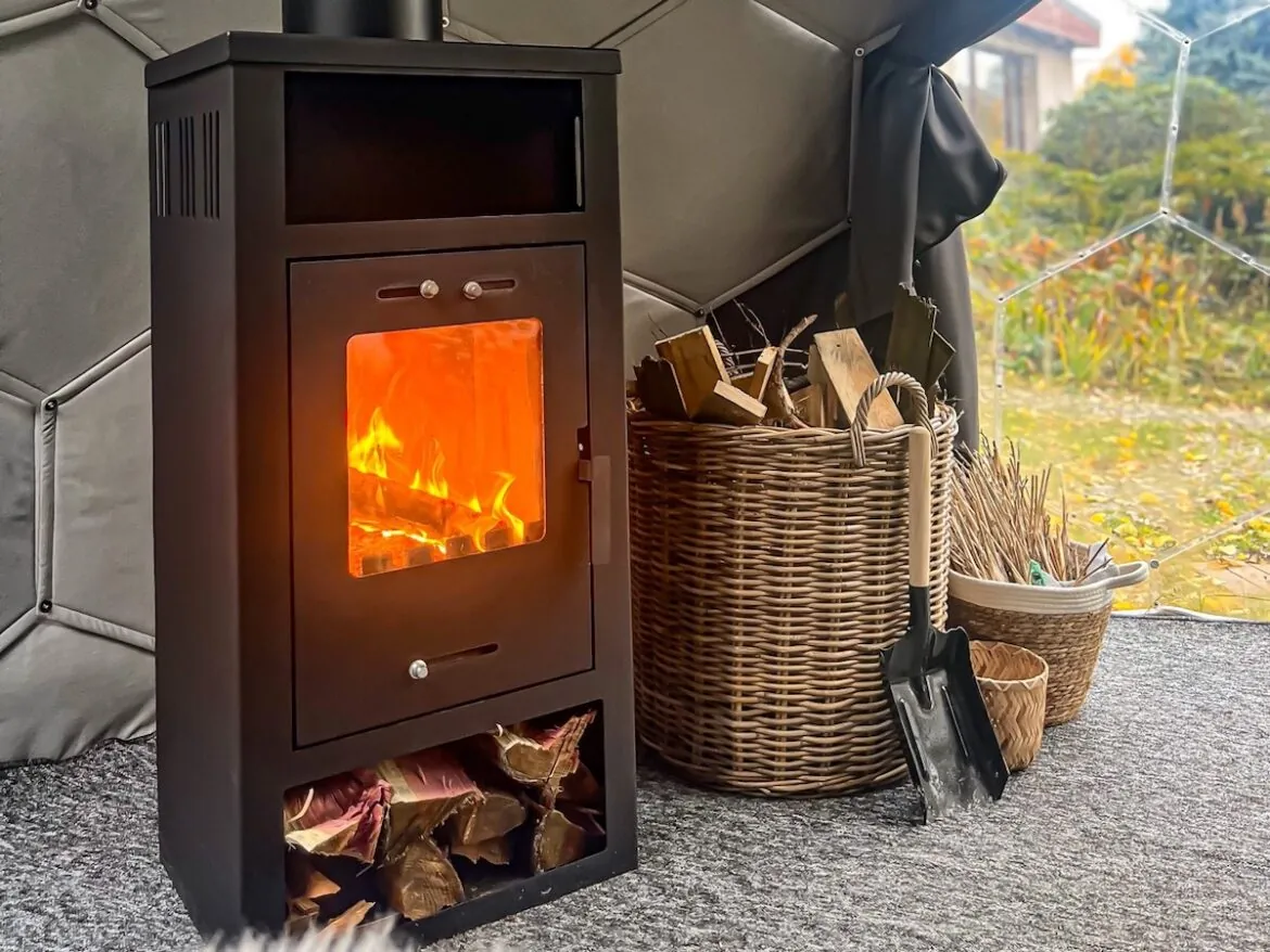 A wood burning stove inside a Hypedome