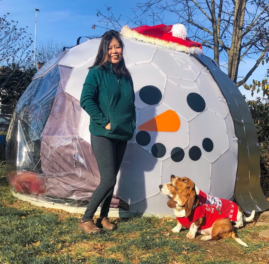 Cece and her dogs in front of the dome