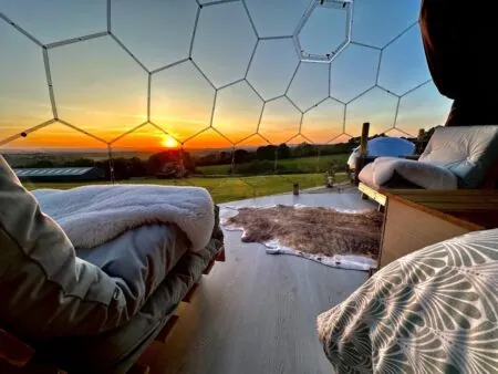 A picturesque view from inside of the glamping bedroom dome at Deerstone