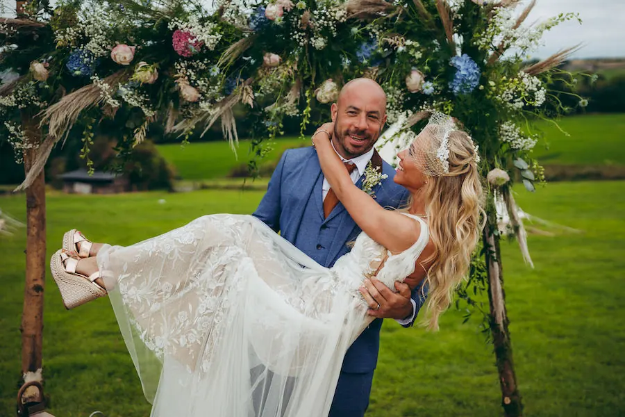 Karin and Chris Greenwood on their wedding day at Deerstone Glamping