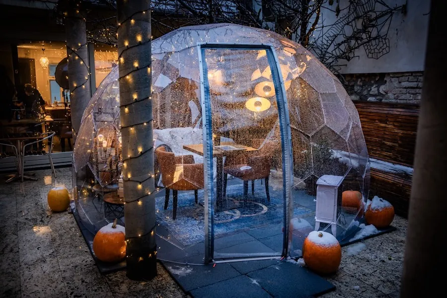 Dining dome arranged as comfortable living room at Teyfol restaurant near Budapest