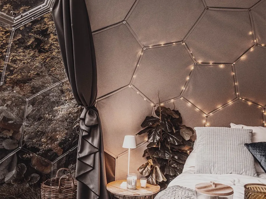 A comfortable glamping dome interior