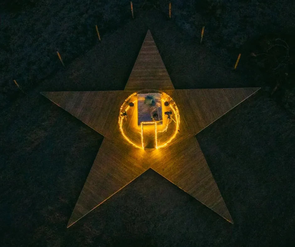 A beautiful clear Hypedome dome on the star-shaped deck for stargazing