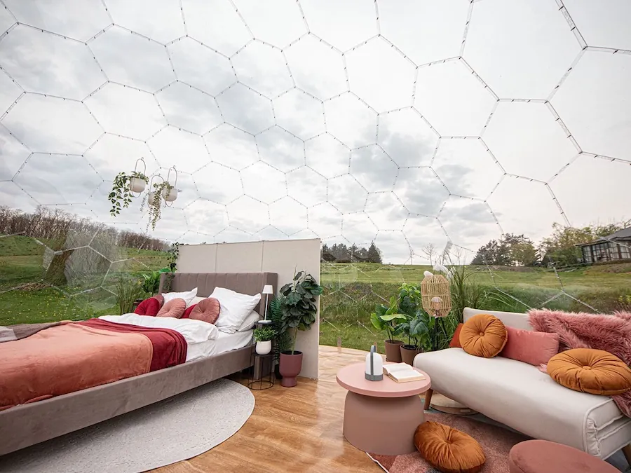 A glamping interior inside the Hypedome L large geodesic dome