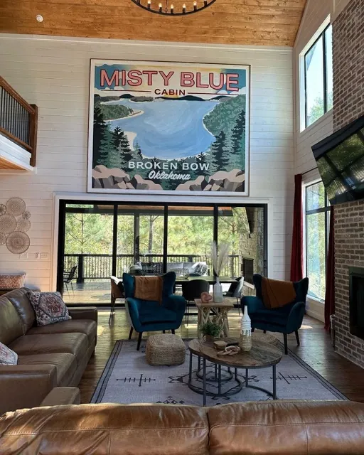 A luxurious and comfortable interior of the Misty Blue Cabin with the original vintage mural