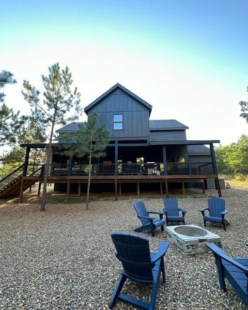 The back of the Misty Blue cabin with the fire pit