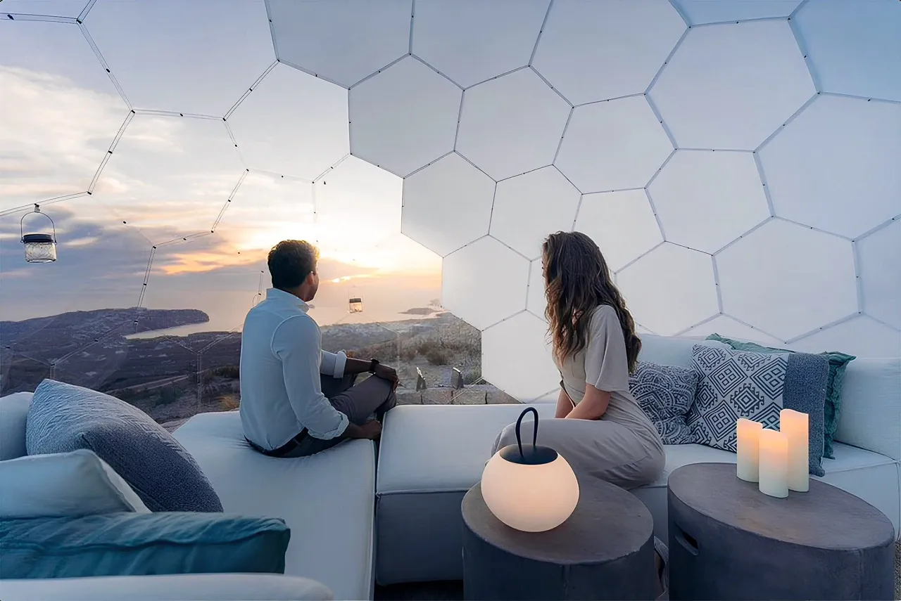 A couple admiring the view from the Opal Hypedome