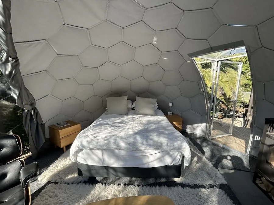 Garden bedroom dome interior with a comfortable bed
