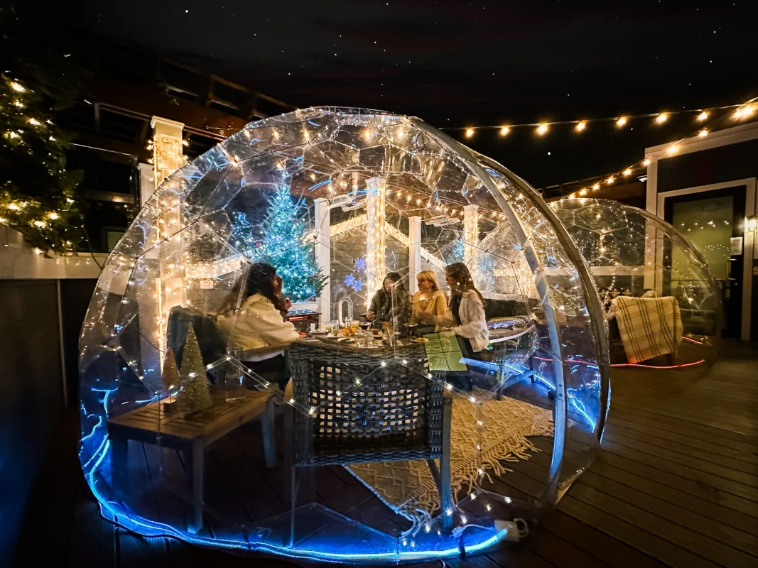 An illuminated dining dome in Rumba restaurant on Long Island