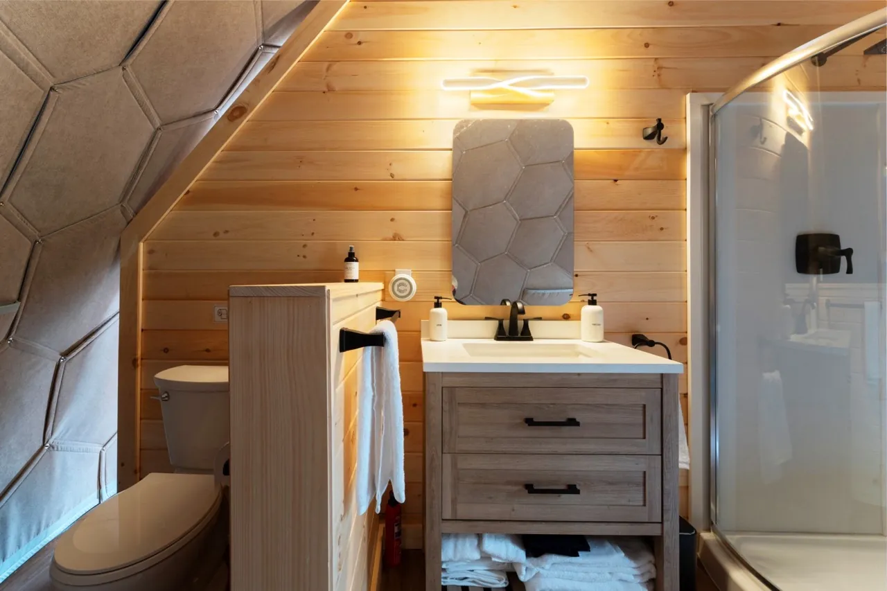 A bathroom section in a Nova Nook glamping dome